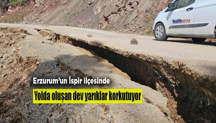 Yolda oluşan dev yarıklar korkutuyor