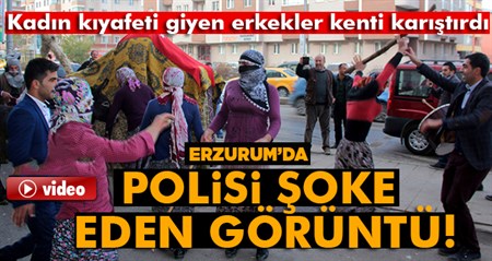 Sokakta kadin kiyafeti giymis erkeklerin oyunu polisin dikkatini çekti