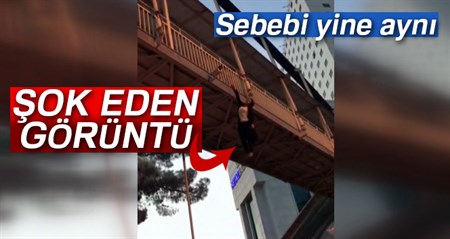 Uyusturucu içtigi iddia edilen kiz, kendisini üst geçitten sarkitti