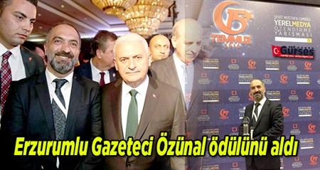 Erzurumlu Gazeteci Özünal ödülünü aldi