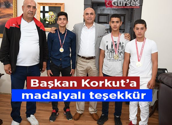 Baskan Korkut’a madalyali tesekkür