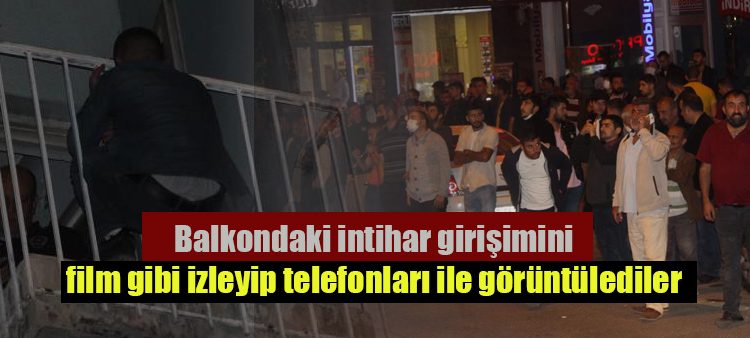 Balkondaki intihar girisimini film gibi izleyip telefonlari ile görüntülediler